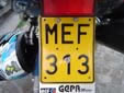 Motorcycle plate (old style). M = motorcycle