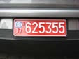 Temporary plate (old style); valid until end of February 2007<br>Blue sticker = taxes paid (while a red sticker means tax free)