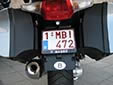 Motorcycle plate. 1 = standard plate. M = motorcycle