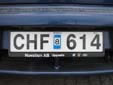 Normal plate (old style, but still issued on request) with a validation sticker.<br>Since 2010, validation stickers are not used anymore.