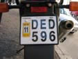 Motorcycle plate (old style, but still issued on request) with a validation sticker.<br>Since 2010, validation stickers are not used anymore.