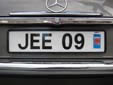 Personalized plate (old style, but still issued on request) with a validation sticker.<br>Since 2010, validation stickers are not used anymore.