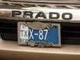 Taxi plate. TX = taxi<br>The white 'control plate' on the left, indicates that taxes have been<br>paid until the end of 2010 (payable per year, half-year or quarter).<br>Submitted by Lars from the Netherlands