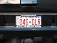 Dealer plate. DLR = dealer