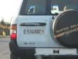 Temporary plate (rear). The first part of the plate, including the<br>letter G, is missing. E (should be GE) = Genève. Z = no taxes paid