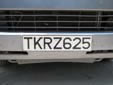 Taxi plate (front, old style). T = taxi