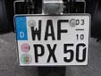 Seasonal motorcycle plate; valid from 1 March until<br>the end of October. WAF = Warendorf