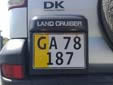 'Parrot' plate (commercial vehicles) (old style, but still issued on request)<br>Unlike the vehicles with completely yellow plates, these are also for private use.