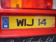 Personalized plate (rear) with an unofficial euroband<br>NI = Northern Ireland. IJ = Down, but this<br>does not apply to personalized plates
