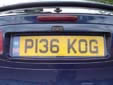 Normal plate (rear) with an unofficial euroband<br>P = registered between August 1996 and July 1997. OG = Birmingham