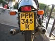 Motorcycle plate. PM = Guildford<br>R = registered between August 1976 and July 1977