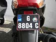 Motorcycle plate with an unofficial, yet tolerated,<br>old style color scheme. G = Gibraltar