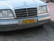 Taxi plate (front). TA = taxi