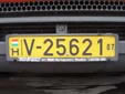 Import truck plate; valid until the end of 2007. V = import<br>Yellow background = commercial vehicle