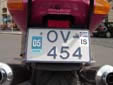 Motorcycle plate with an IS sticker