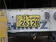 Trailer plate. دولة الكويت = Dawlat al-Kuwait (State of Kuwait)<br>Public transport vehicles, including taxis, have similar plates.