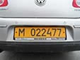 Foreign owned vehicle's plate (old style). M = foreign company
