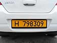 Foreign owned vehicle's plate (old style). H = foreign resident
