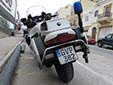 Governmental motorcycle plate (GV; old style plate which is larger in size). GVP = Police