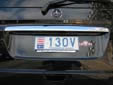 Rental car's plate (rear). V = rental vehicle