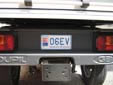Electric vehicle's motorcycle plate. EV = elctric vehicle