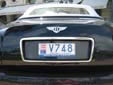 Rental car's plate (rear). V = rental vehicle