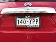Normal plate (front, 2008 series) from Distrito Federal<br>Delantera (partly behind the frame) = front