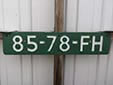 Dealer plate (old style). FH = dealer