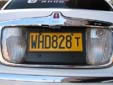 Small size taxi plate. T = Taxi