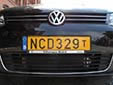 Taxi plate. T = Taxi