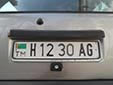 Normal plate (old style with a wider flag and with<br>only one leading letter). AG = Aşgabat