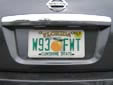 Normal plate (1997 series) from Miami-Dade County<br>Plates with 'Sunshine State' are issued in Miami-Dade County only