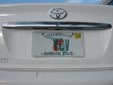 Personalized plate (2003 series) from Miami-Dade County<br>Plates with 'Sunshine State' are issued in Miami-Dade County only