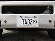 Truck plate. M = mileage weight tax. K = 28,001 - 32,000 lbs.