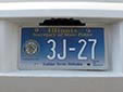 Secretary of State Police vehicle's plate