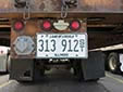 Semi trailer plate. P = permanent. ST = semi trailer
