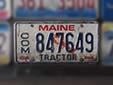 Commercial tractor plate (1987 series). COM = commercial