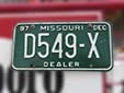Dealer plate (1997 series). D = dealer