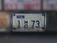 Motorcycle plate (old style). 1 = Douglas County. MC = motorcycle