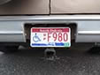 Handicapped driver's plate. DP = disabled person