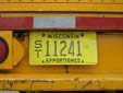 Apportioned semi-trailer plate (inter-state commercial vehicles)<br>ST = semi-trailer